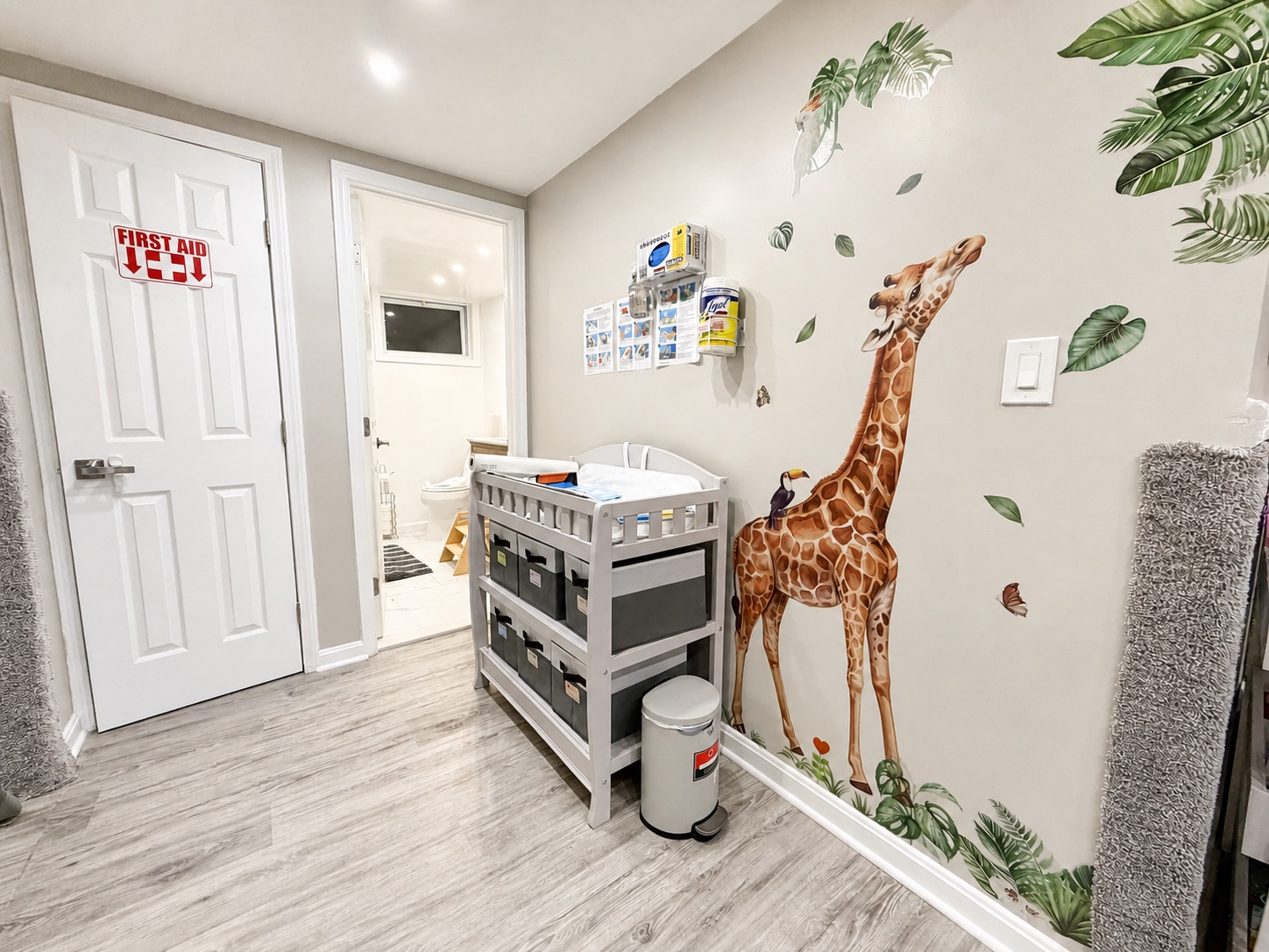 The actual Bluebird Learning Nest diaper changing area with an organized changing station and hygiene supplies