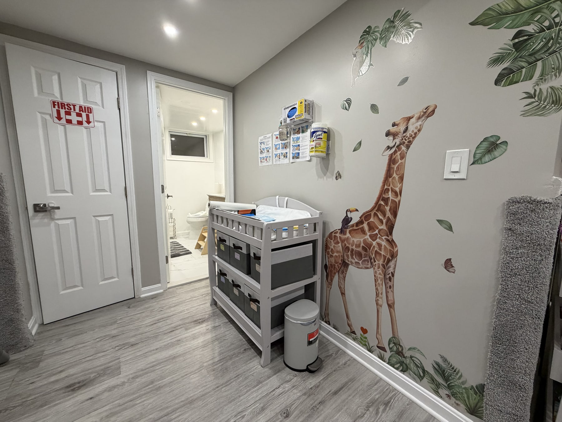 The actual Bluebird Learning Nest diaper changing area with an organized changing station and hygiene supplies