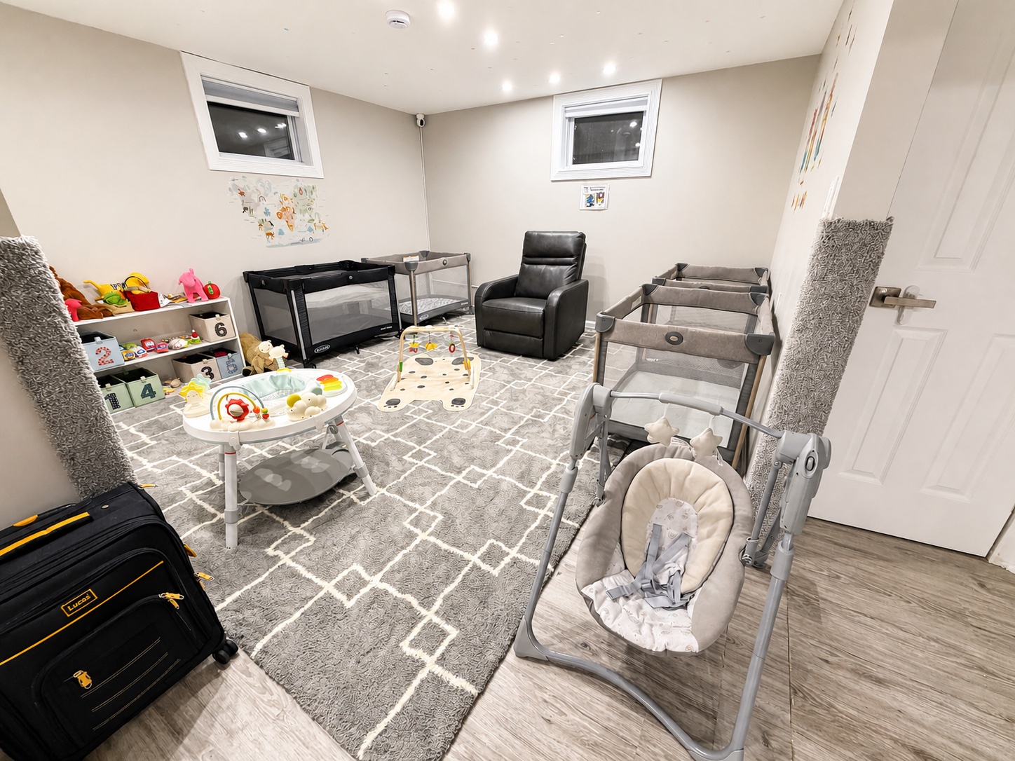 The actual Bluebird Learning Nest infant napping area with individual sleep spaces, a care chair, and infant materials
